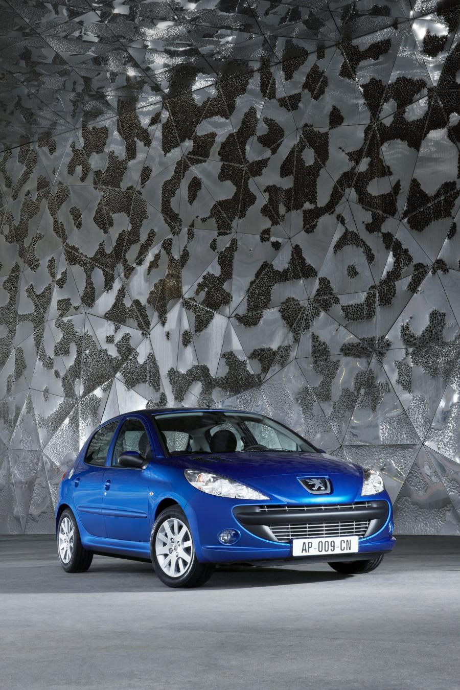  Peugeot 206 Plus 2009 года  (фото 38 из 49)